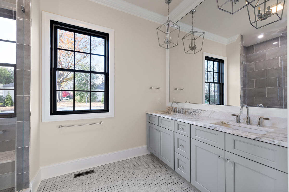 Bathroom in Delaware custom home with double vanity by Bromwell Construction