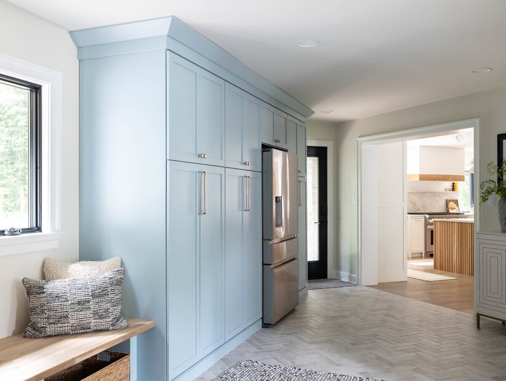 Blue cabinetry in Delaware whole home remodel by Bromwell Construction