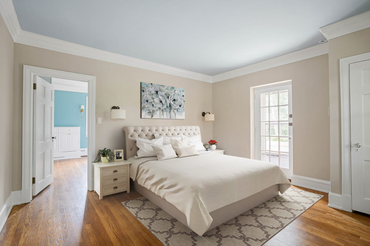 Bedroom remodel in Wilmington, Delaware with door open to dressing room