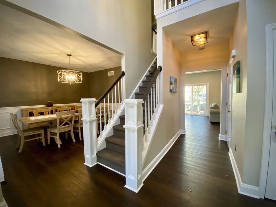 Remodeled entry and stair way by Bromwell Construction