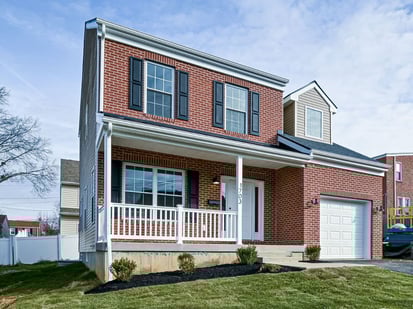 Delaware New construction home exterior on sunny day with attached garage by Bromwell Construction