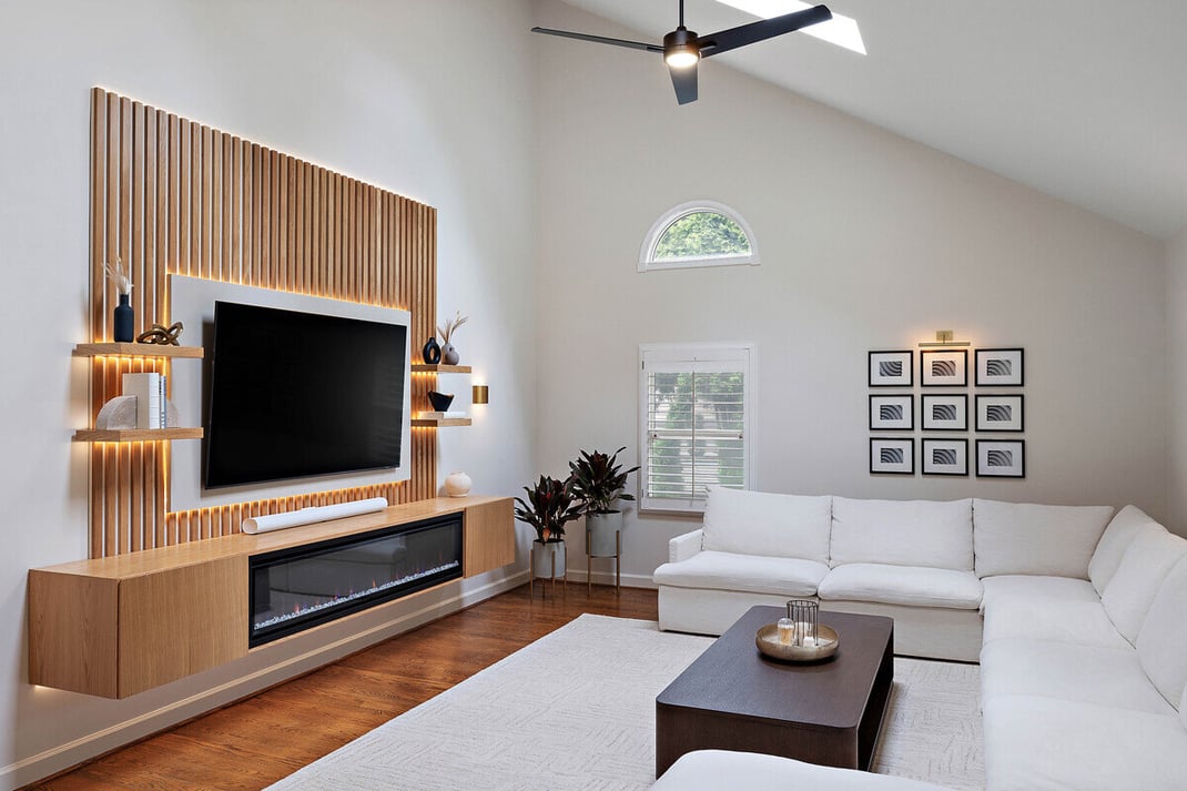 Delaware living room addition above garage with skylight and windows by Bromwell Construction