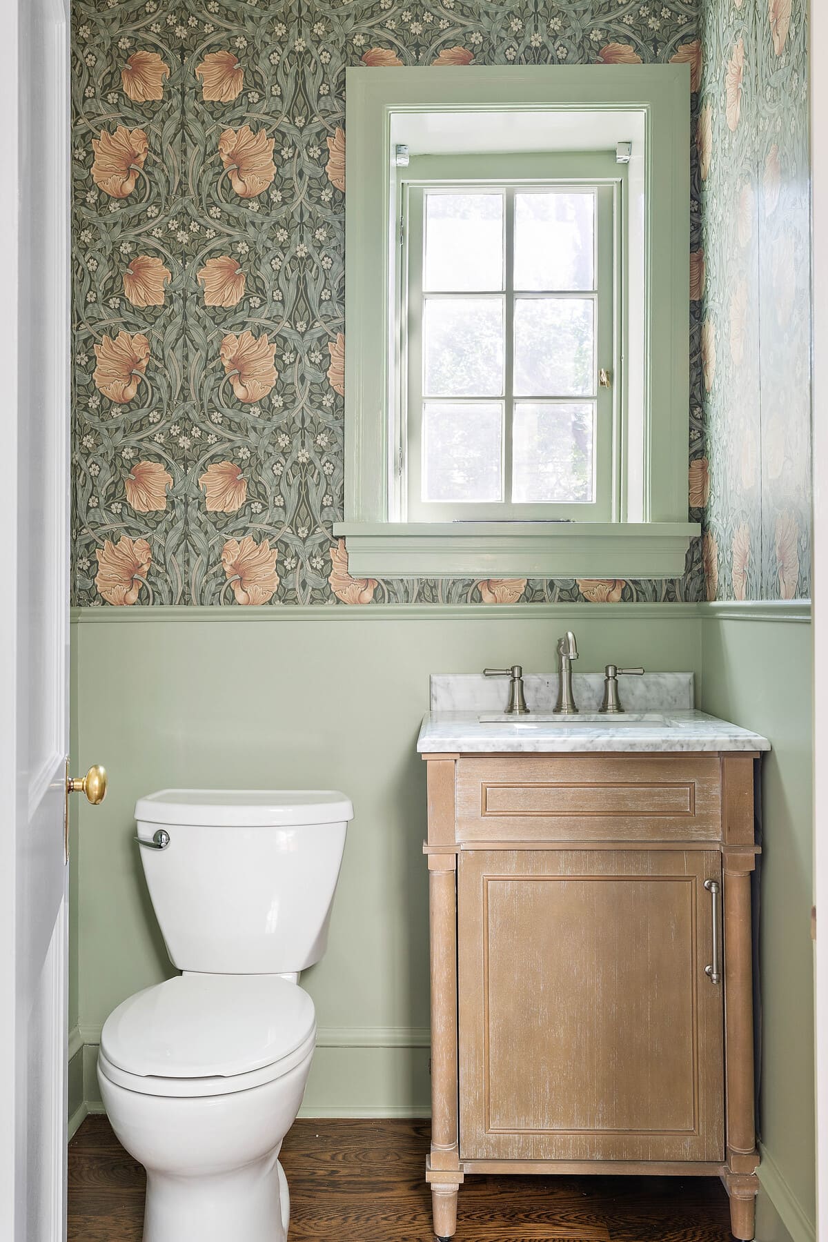 Delaware powder room remodel with wallpaper design by Bromwell Construction