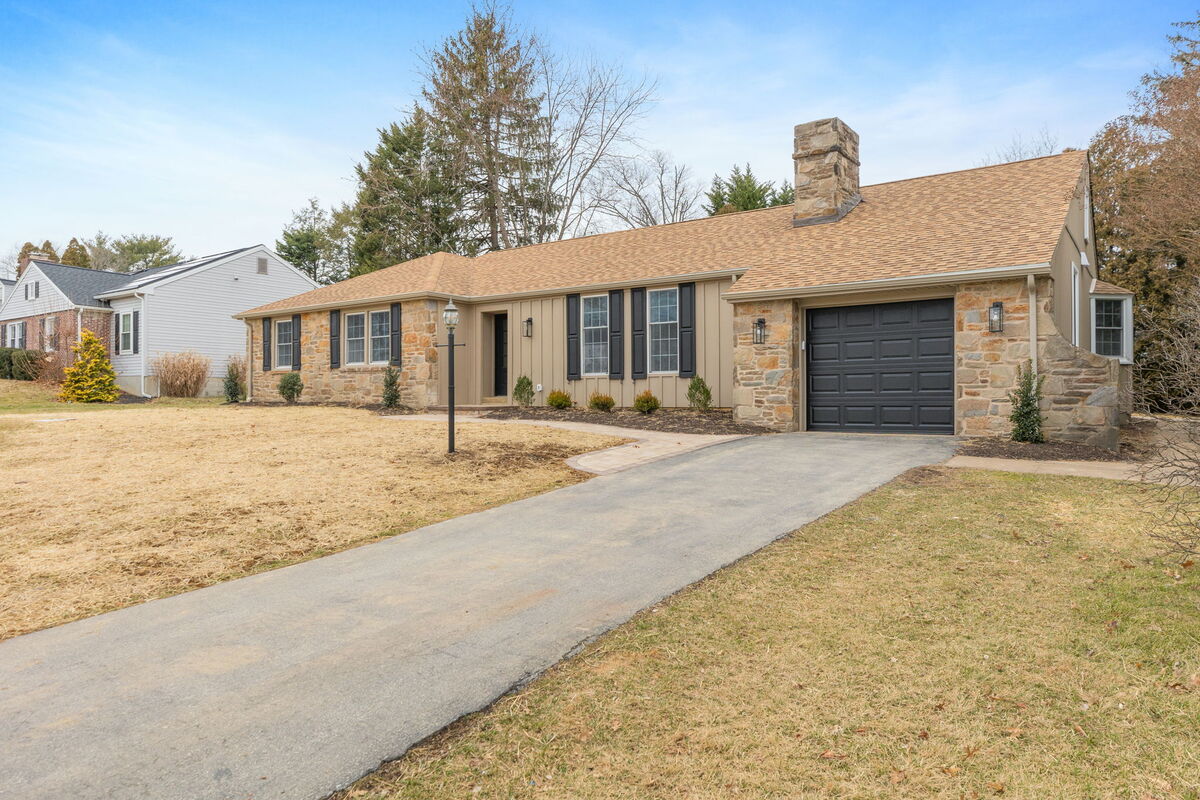 Front exterior of one-story home in Delaware with attached garage remodeled by Bromwell Construction