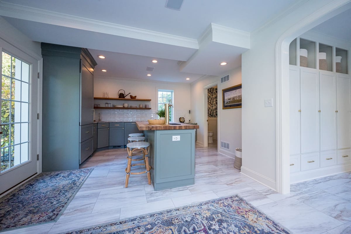 Home remodel with view of kitchen and custom cabinetry