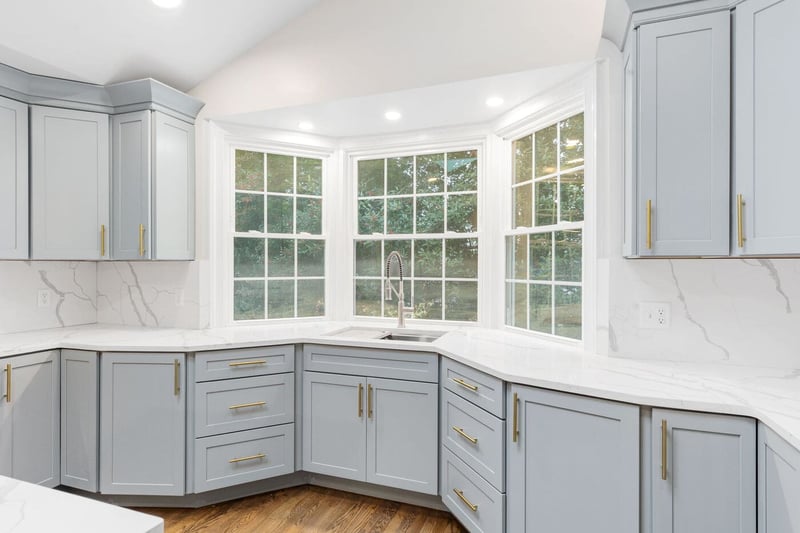 https://bromwellconstruction.com/hs-fs/hubfs/Matte%20light%20blue%20and%20gray%20shaker-style%20cabinets%20in%20Wilmington%2C%20DE%20kitchen%20remodel.jpg?width=800&height=533&name=Matte%20light%20blue%20and%20gray%20shaker-style%20cabinets%20in%20Wilmington%2C%20DE%20kitchen%20remodel.jpg