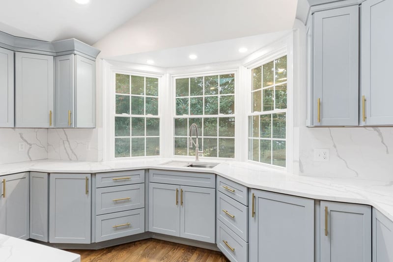 Matte light blue and gray shaker-style cabinets in Wilmington, DE kitchen remodel