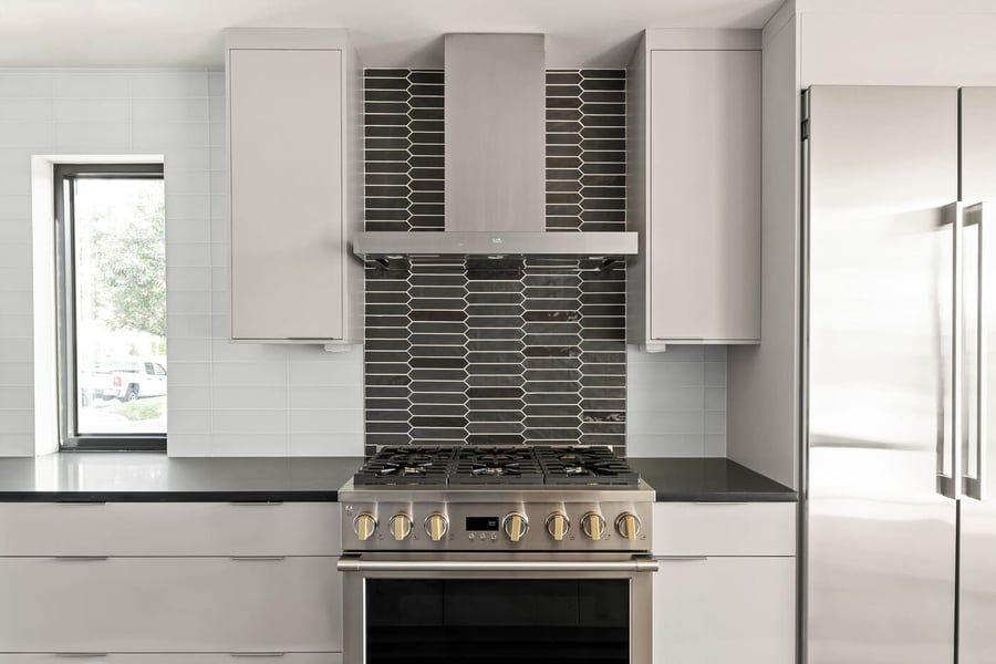 Modern black backsplash behind oven in Delaware kitchen remodel