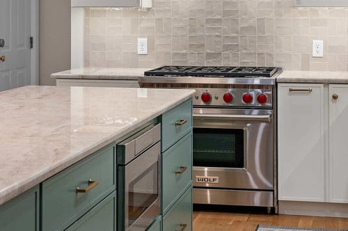 Microwave in island in Delaware kitchen by Bromwell Construction