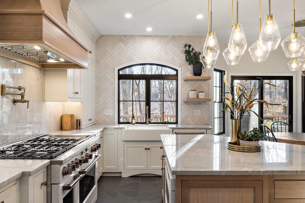 Delaware kitchen remodel with island and window behind sink by Bromwell Construction