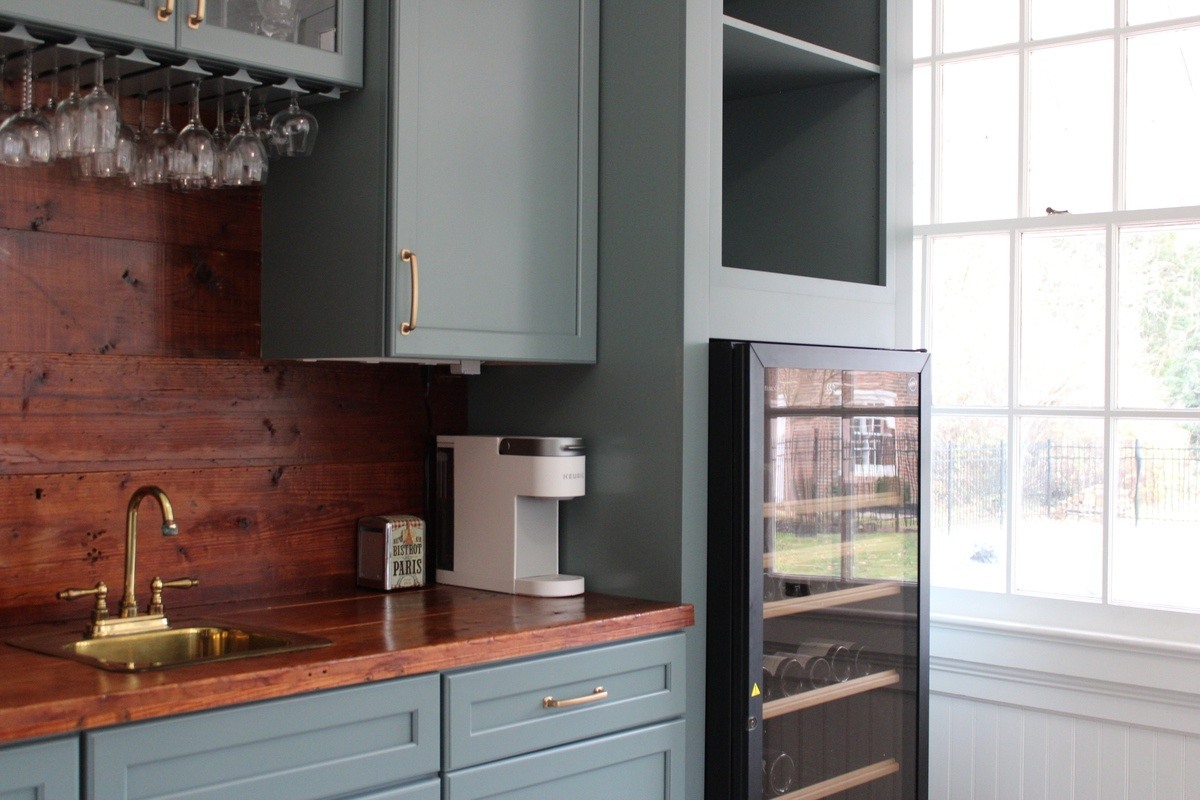 Wilmington, Delaware kitchen remodel with wine fridge and brass hardware by Bromwell Construction