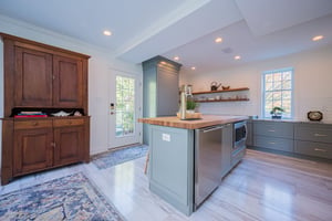 Kitchen remodel with recessed lighting and kitchen island with dishwasher and microwave
