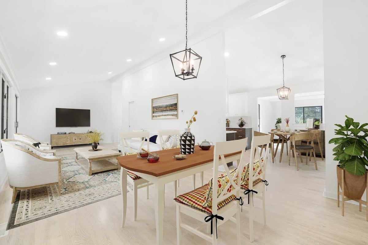 open concept living room space with recessed lighting and slated ceiling