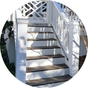 White deck stair set with wooden steps