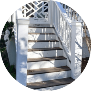 White deck stair set with wooden steps