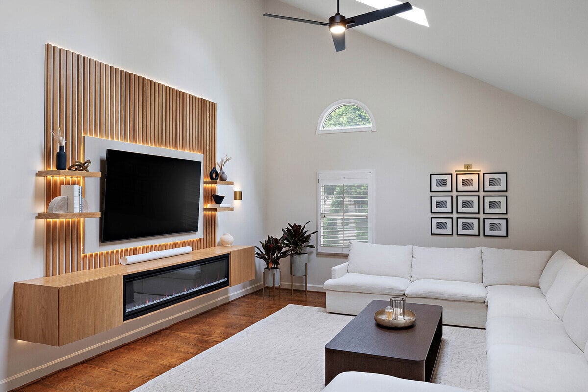 Delaware living room addition above garage with skylight and windows by Bromwell Construction